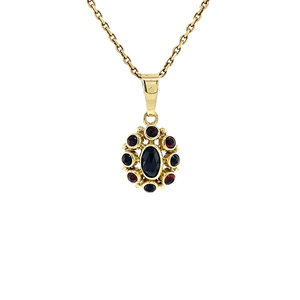 Gold entourage pendant with garnet 14 krt