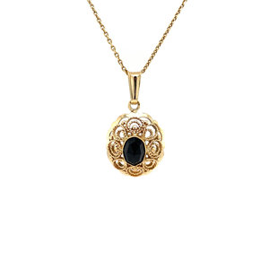 Gold pendant with garnet 14 krt