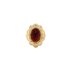 Gold ring with garnet 14 crt