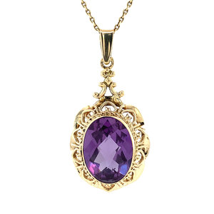 Gold pendant with purple sapphire 14 krt