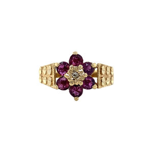 Bicolour entourage ring with diamond and ruby 9 krt