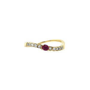 Gold strike ring with ruby and diamond 18 crt