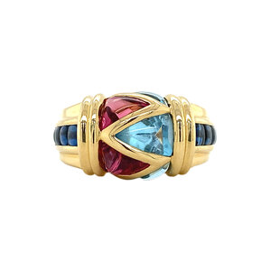 Gold ring with sapphire, pink and blue topaz 18 crt