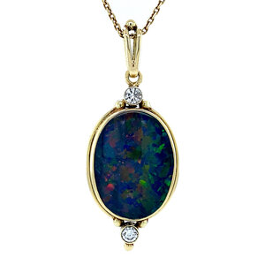 Gold pendant with opal triplet and diamond 14 krt