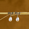 vintage Gold ear studs bow with pearl 14 krt
