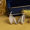 vintage Bicolour gouden  oorstekers met diamant 18 krt