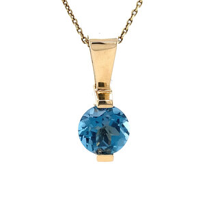 Gold pendant with topaz 14 kt