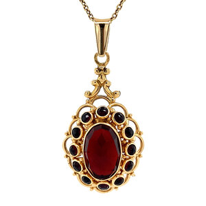 Gold pendant with garnet 14 kt