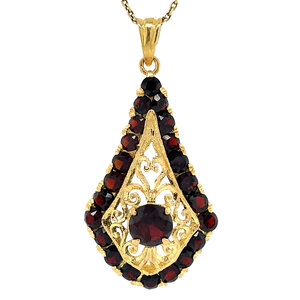 Golden pendant with garnet 18 kt