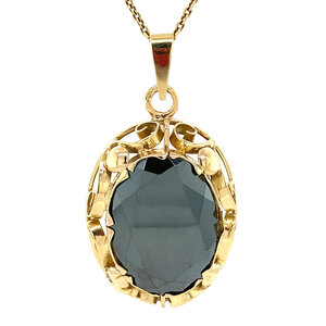 Gold pendant with haematite 14 krt