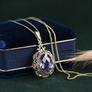 Gold pendant with purple sapphire 14 carat