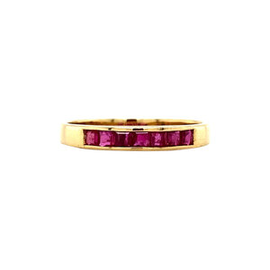 Gold row ring with ruby 18 krt