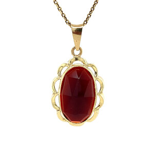 Gold pendant with garnet 14 krt