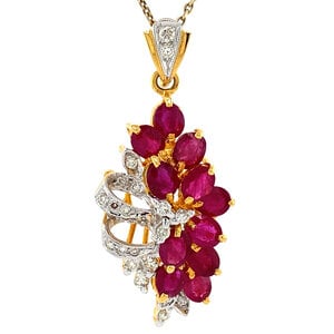 Gold pendant with ruby and diamonds 14 krt