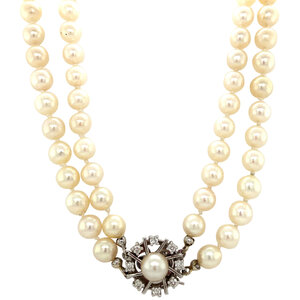 Pearl necklace with white gold diamond clasp 14 krt