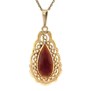 Golden pendant with garnet 14 kt