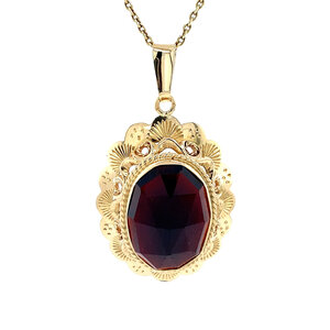 Gold pendant with garnet 14 krt