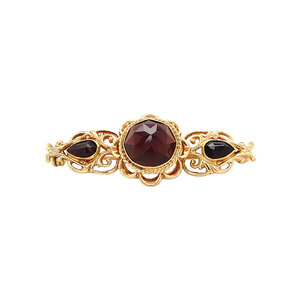 Gold brooch with garnet 14 kt