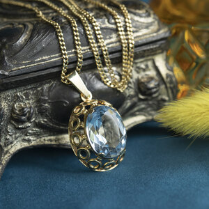 Gold pendant with blue spinel 14 kt