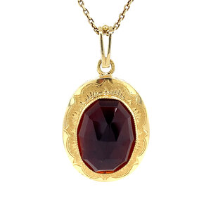 Gold pendant with garnet 14 krt