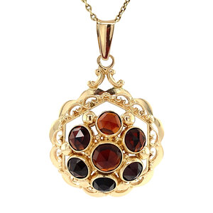 Gold pendant with garnet 14 kt