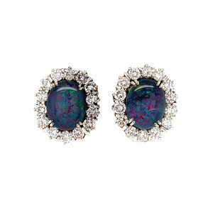 White gold ear clips with diamond and opal 14 krt