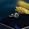 vintage Ring met topaas en diamant 9 krt