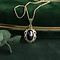 vintage Gold pendant with garnet 14 krt