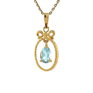 Gold pendant with topaz 14 krt