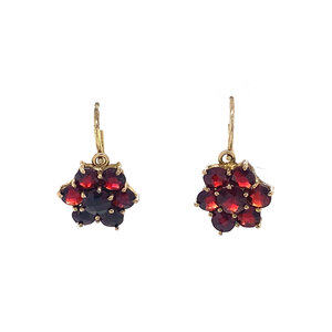 Dormant entourage earrings with garnet 8 crt