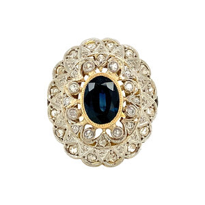 Gold entourage ring with sapphire and diamond 14 krt/850