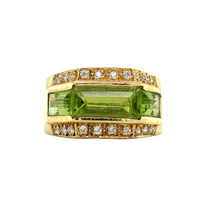Gold ring with peridote and diamond 18 krt