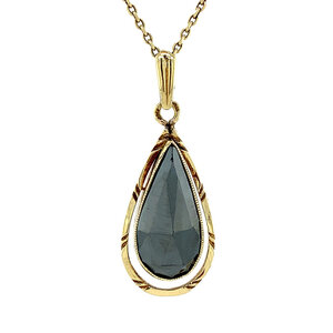 Gold pendant with haematite 14 krt