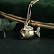 vintage Gouden hanger vis met geel glas 14 krt