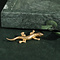 vintage Gold brooch salamander with green colour stone 14 krt