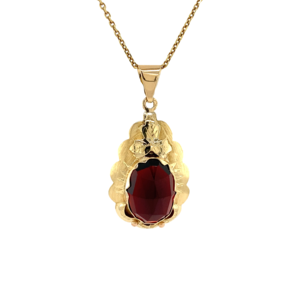 Gold pendant with garnet 14 krt