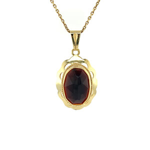 Gold pendant with garnet 14 krt