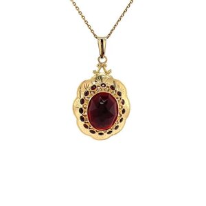Gold pendant with garnet 14 krt