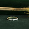 vintage Gold row ring with diamonds 14 krt