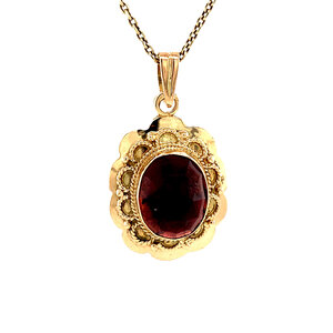 Gold pendant garnet 14 kt