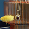 vintage Gouden hanger met granaat 14 krt