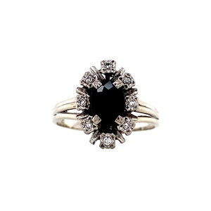 White gold halo ring with diamond and sapphire 18 krt