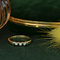 vintage Gold row ring with diamonds 18 krt