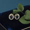 vintage Entourage ear studs with natural sapphire and diamond 12 krt