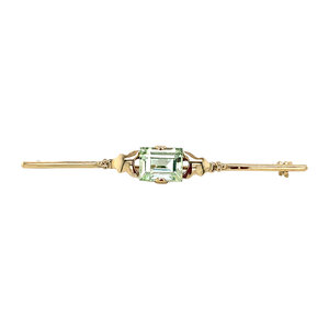 Gold brooch with green spinel 14 krt