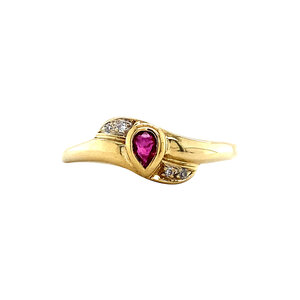 Gold ring with ruby and diamond 14 krt