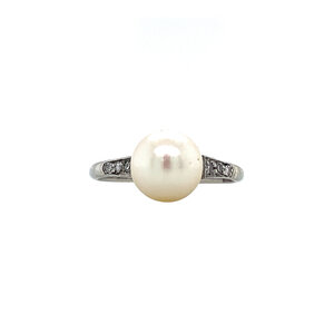 Witgouden ring met parel en diamant 14 krt