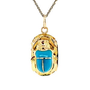 Gouden scarabee hanger met blauwe kleursteen 18 krt