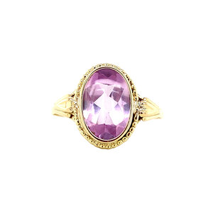 Gouden ring met roze saffier 14 krt