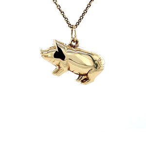 Gold pig pendant 14 krt